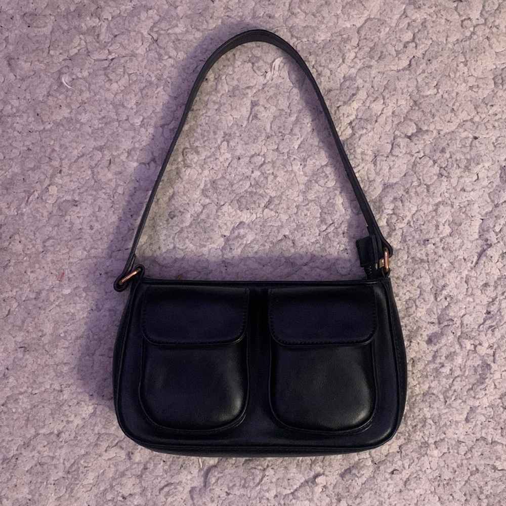 Another Brandy bag I have in black that I don’t use. It’s a good concert size :)